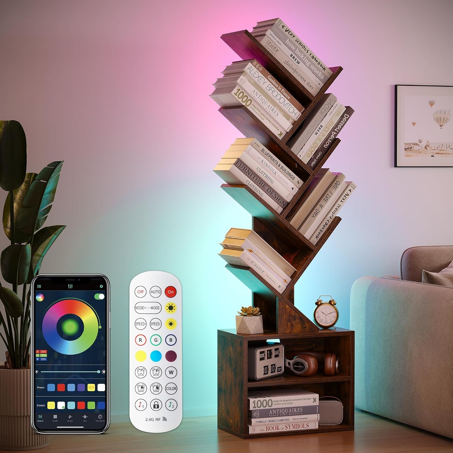 Dark wood tree bookshelf lit by colored LED lights, shown with remote and smartphone app in foreground.