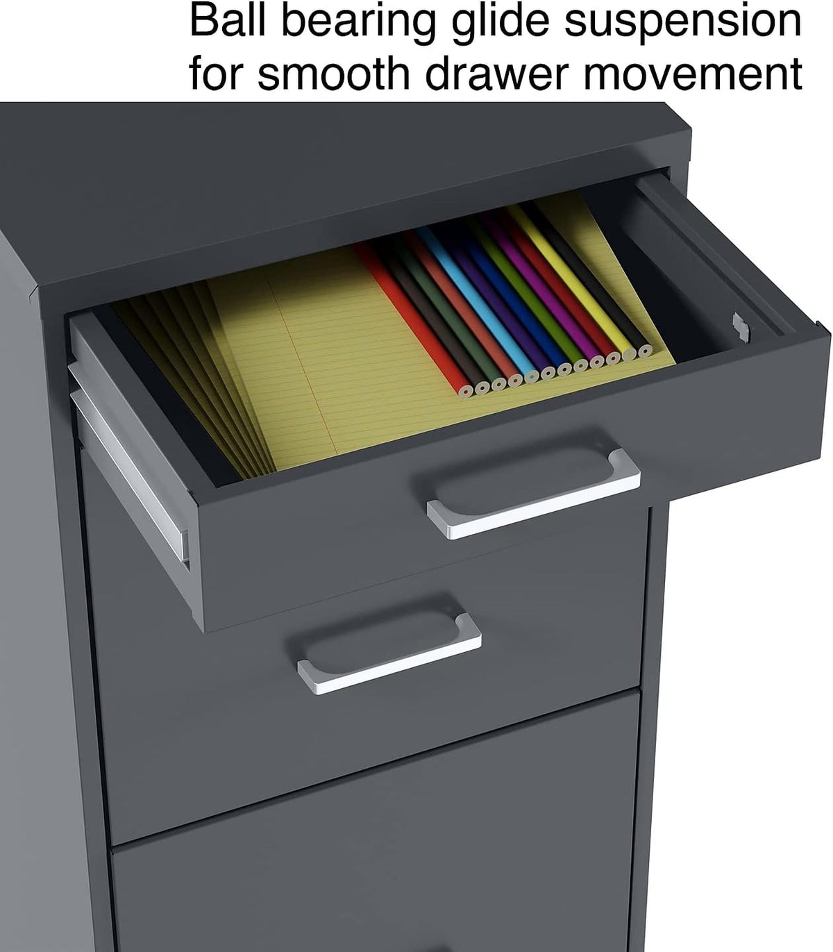 Top accessory drawer open with notepad and pencils visible, showing ball-bearing glide suspension and chrome handle