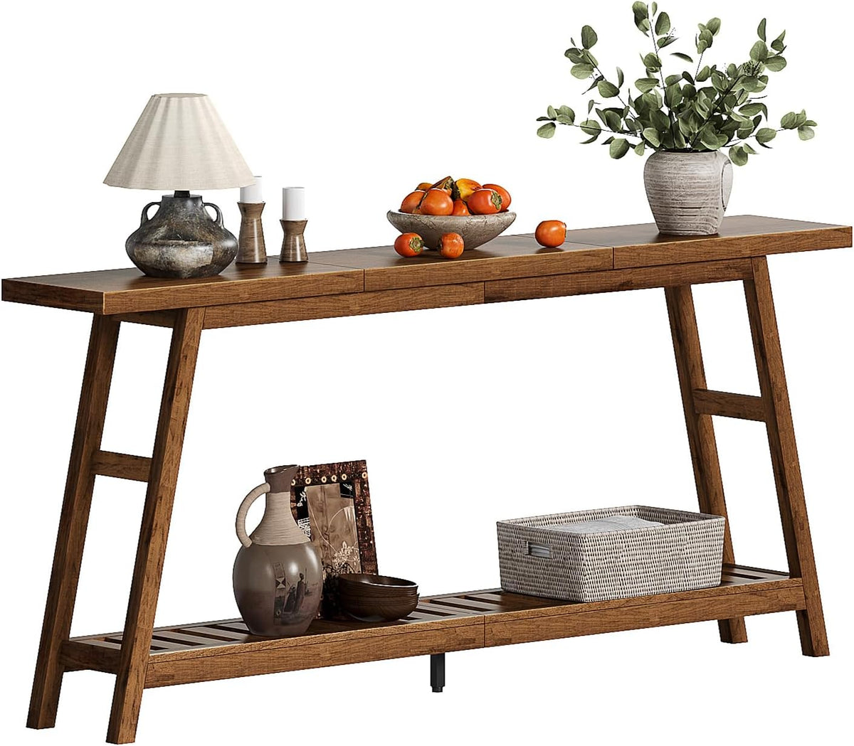 Console table on white background styled with lamps, bowl of fruit, and a basket on the slatted lower shelf
