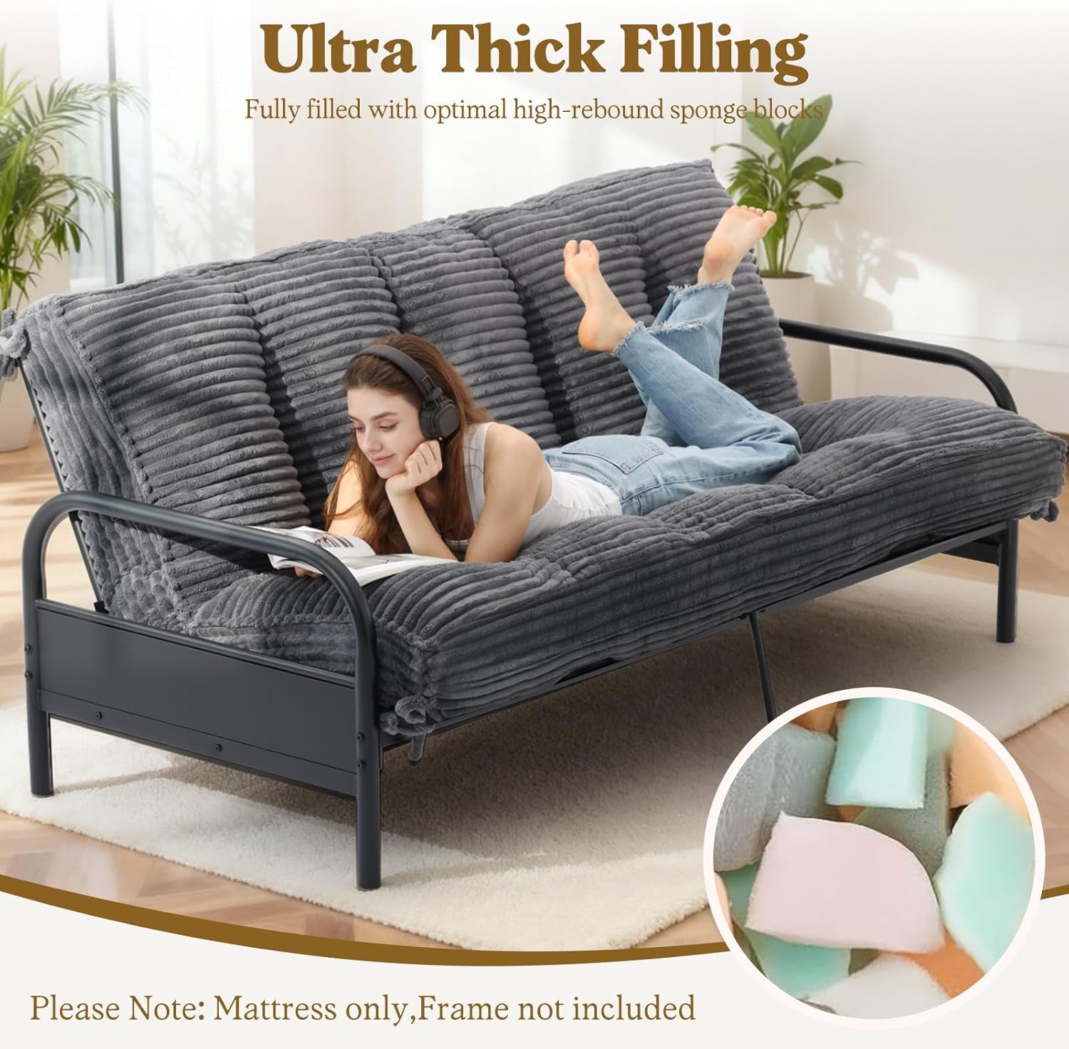 Grey futon mattress used as a sofa on a metal frame with foam piece inset detail