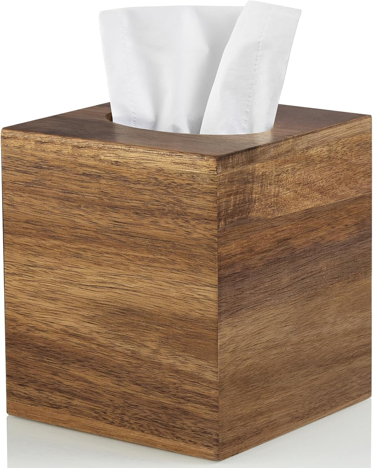 Warm-toned acacia cube tissue cover shown from front-right with a tissue peeking out.