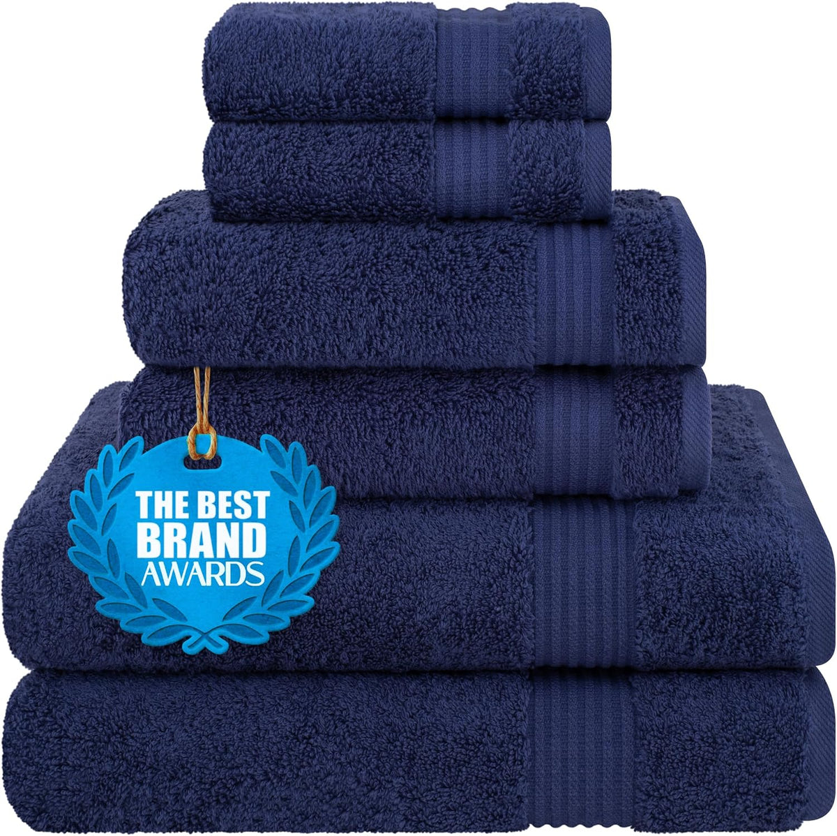 Stack of navy blue folded towels arranged to show pile texture and decorative borders.