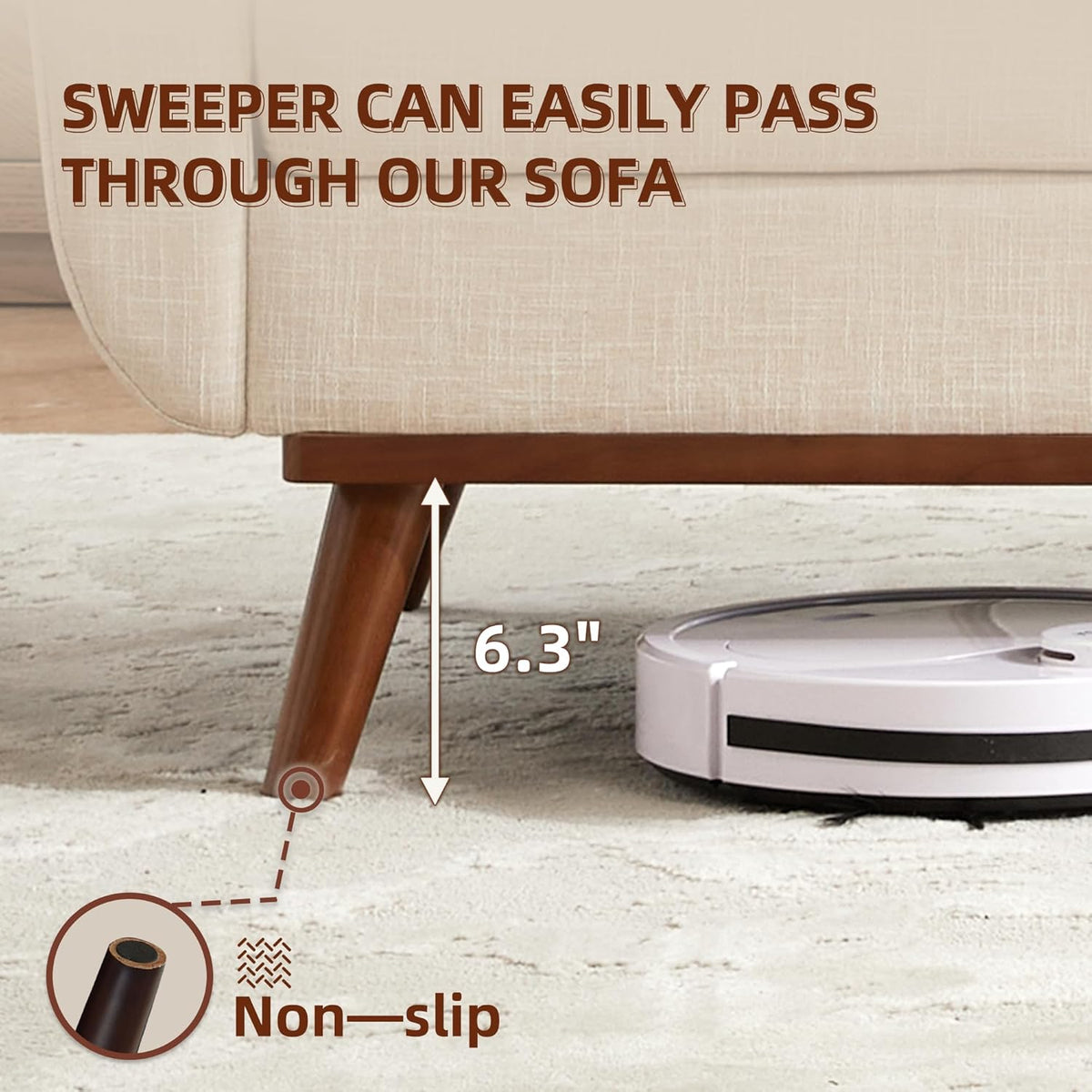 Close-up of a wooden tapered sofa leg and underside clearance with a robot vacuum beside it on a light rug.