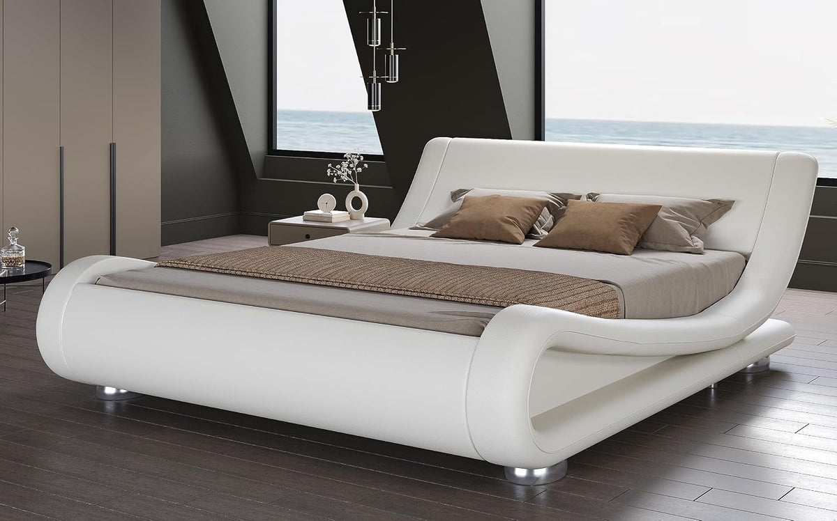 White faux leather wave platform bed angled front-right view on dark hardwood floor with low-profile styling