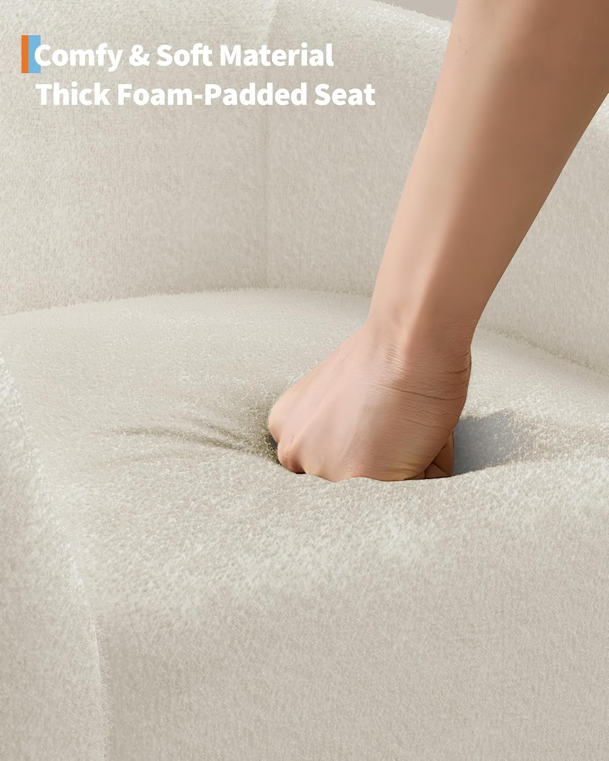 Close-up of a hand pressing into the beige boucle seat, showing the foam compressing.