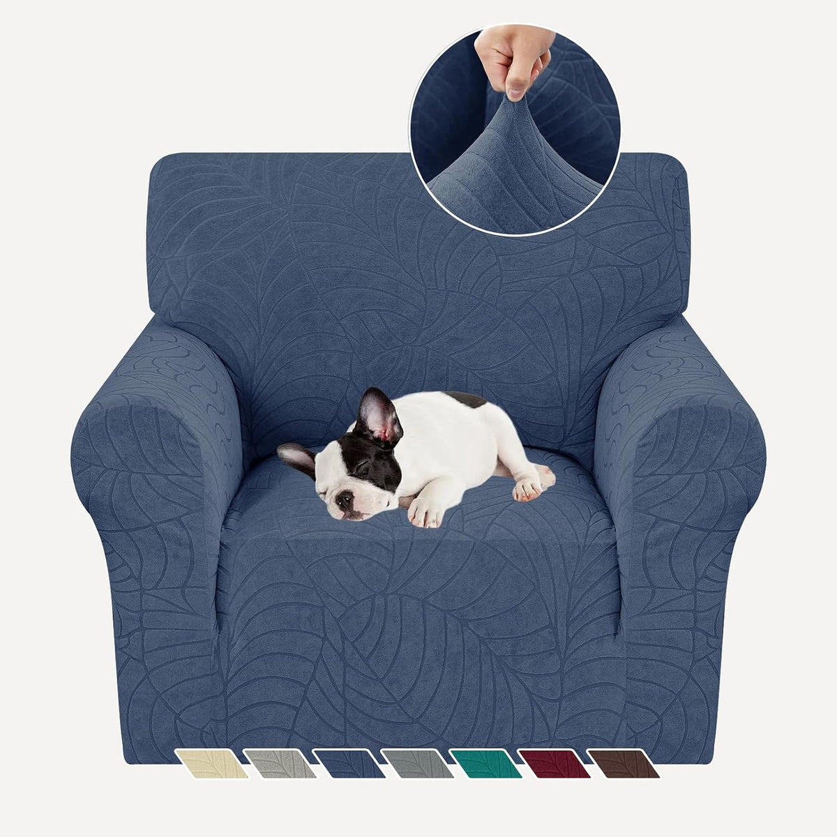 Single-seat armchair covered in textured deep blue slipcover with a small dog sleeping on seat