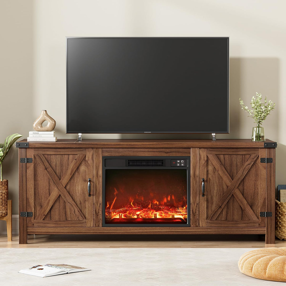 Front view of a dark brown farmhouse TV stand with barn-style doors and a glowing electric fireplace.