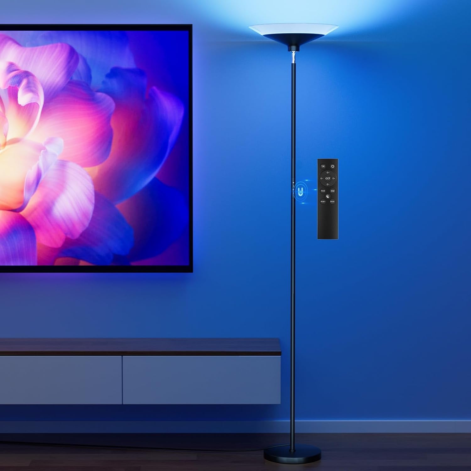 Lamp casting blue bias light on a wall behind a TV, with a remote shown beside the pole.