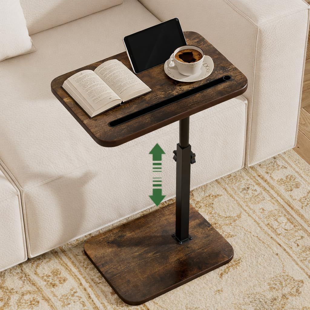 Rustic brown C-table beside a white sofa showing adjustable post and tablet in slot from angled top view