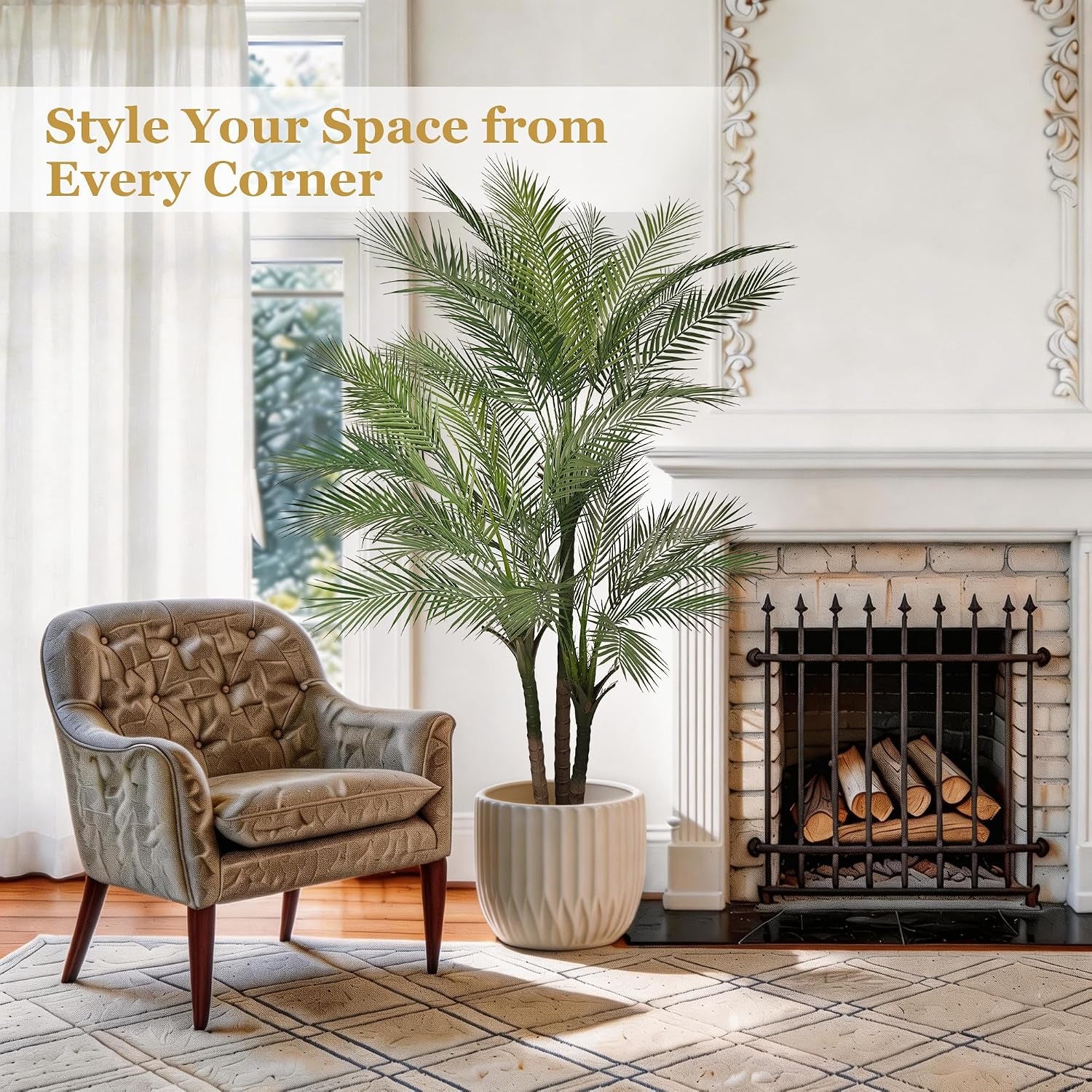 Golden cane palm tree beside a fireplace and armchair in a cream planter