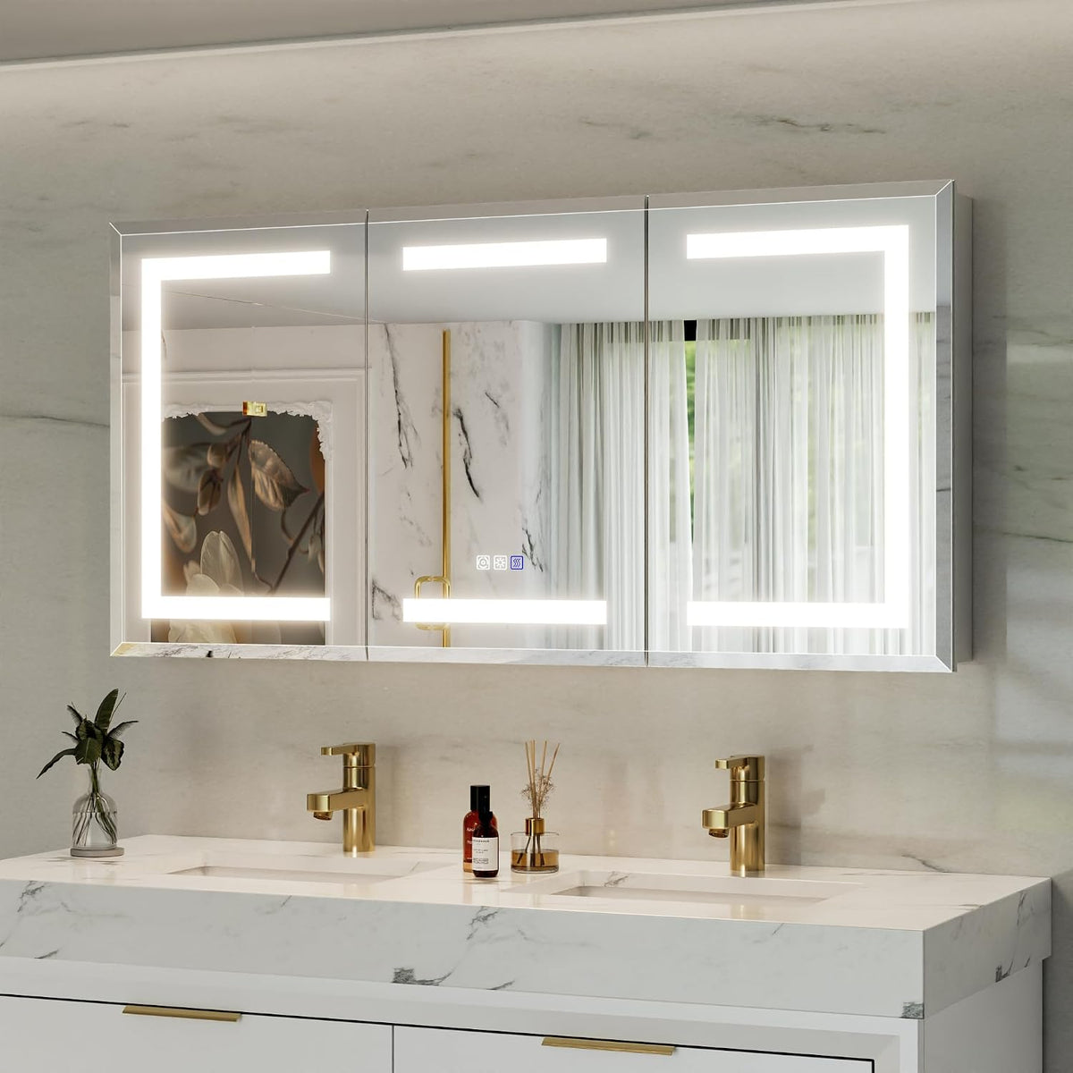 Wider three-door mirrored medicine cabinet with illuminated inlay installed over a double sink vanity.