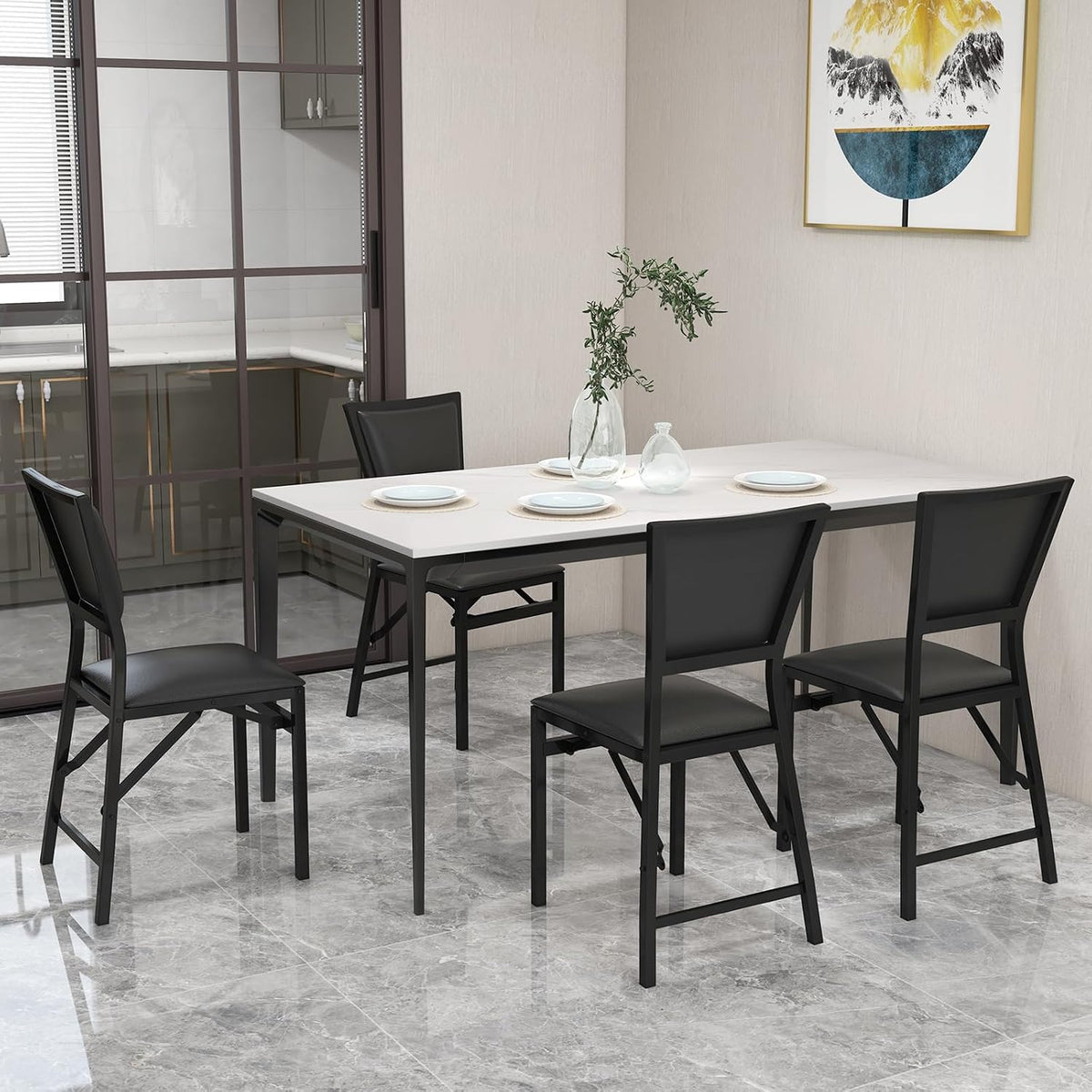 Black folding dining chairs placed around a light dining table in a modern kitchen setting