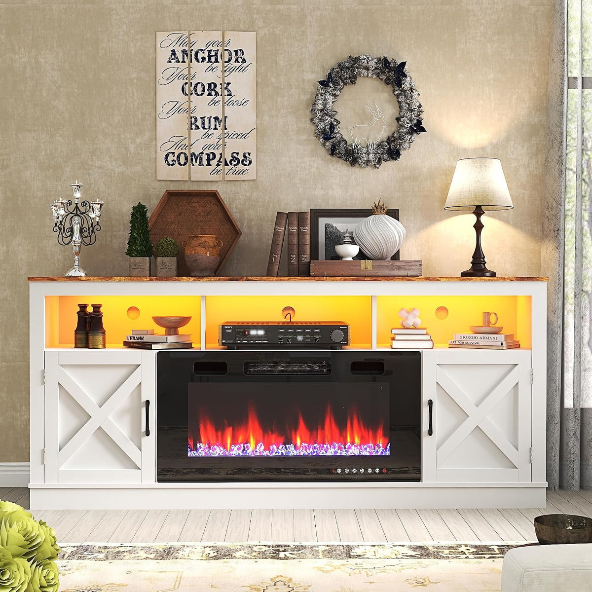 White farmhouse TV stand front view with lit electric fireplace and illuminated open top shelves