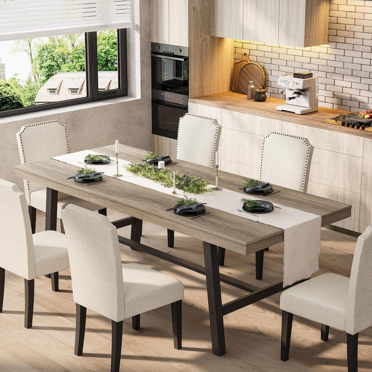 Same table in a lighter wood finish with matching runner and six upholstered chairs in a bright kitchen.