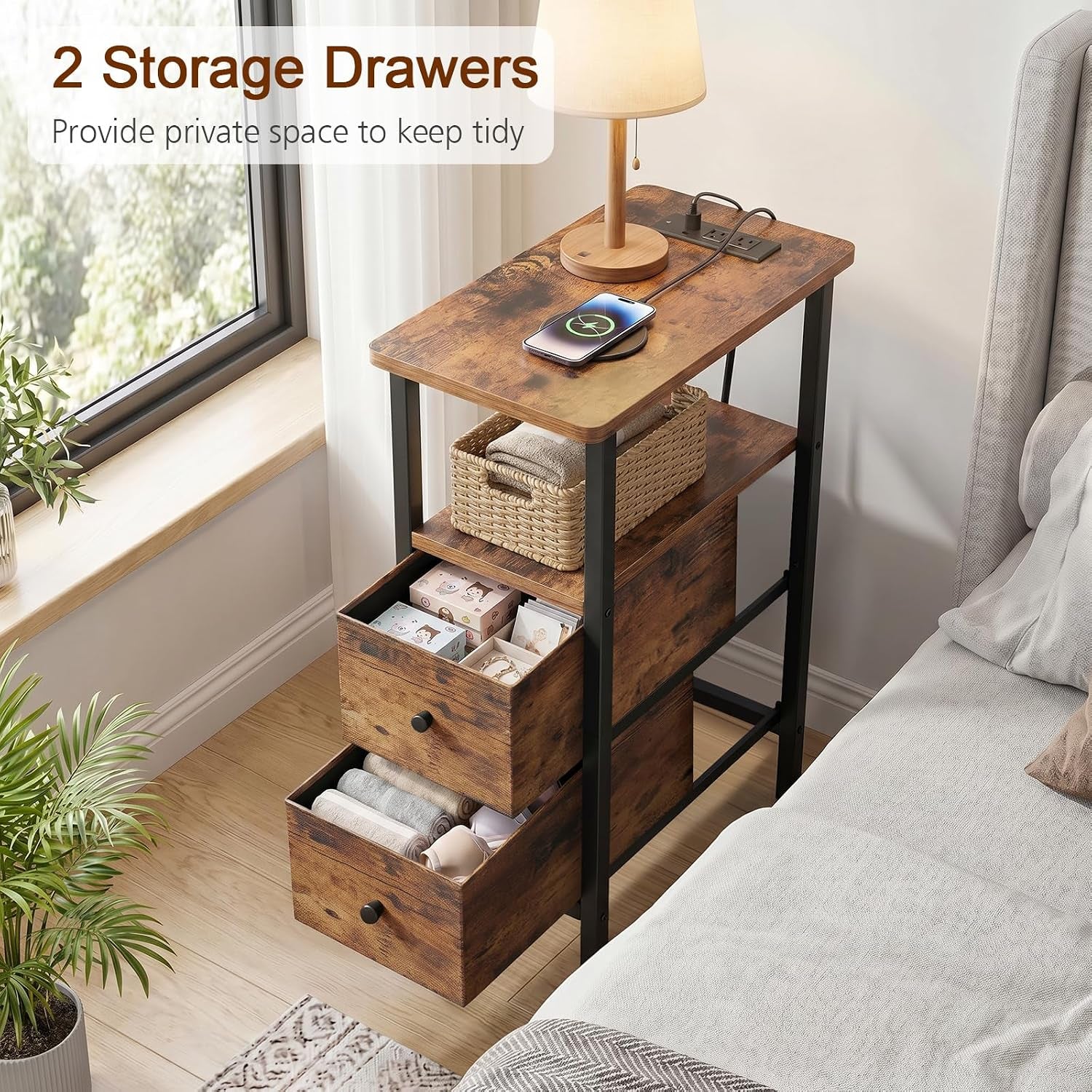 Top-down angle of the side table showing two open fabric-look drawers and a basket on middle shelf