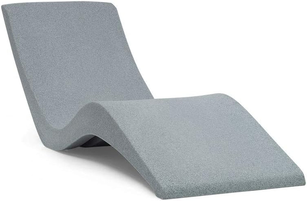 Single gray contoured resin chaise shown against a plain white background, angled to display its wave-shaped profile