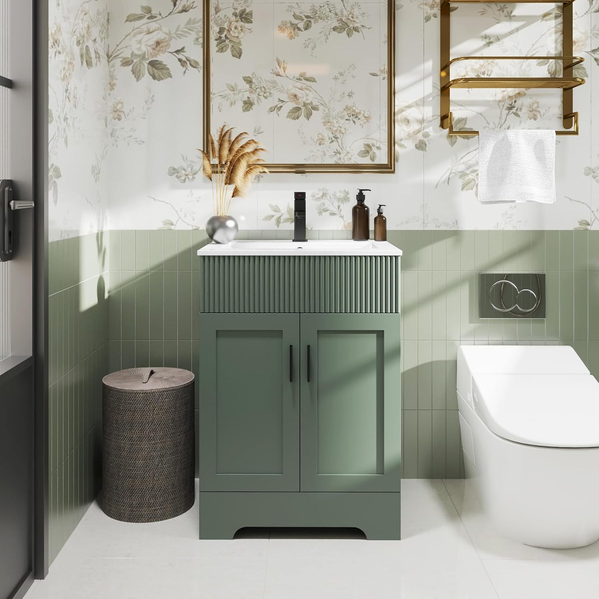 Green vanity with fluted apron, decorative vase on countertop and toilet visible to the right.
