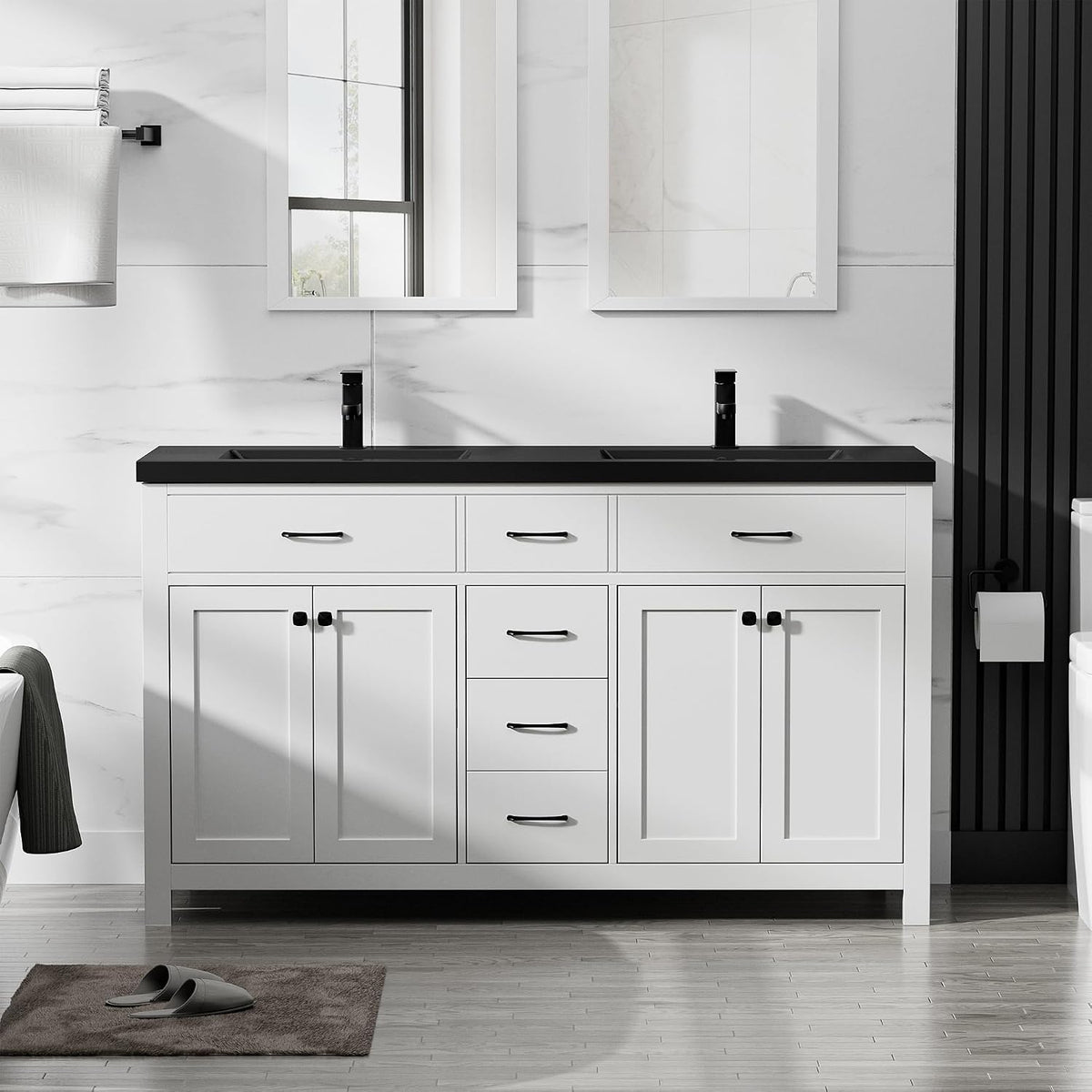 Double-sink white vanity with black countertop and two mirrors above, staged in bright bathroom