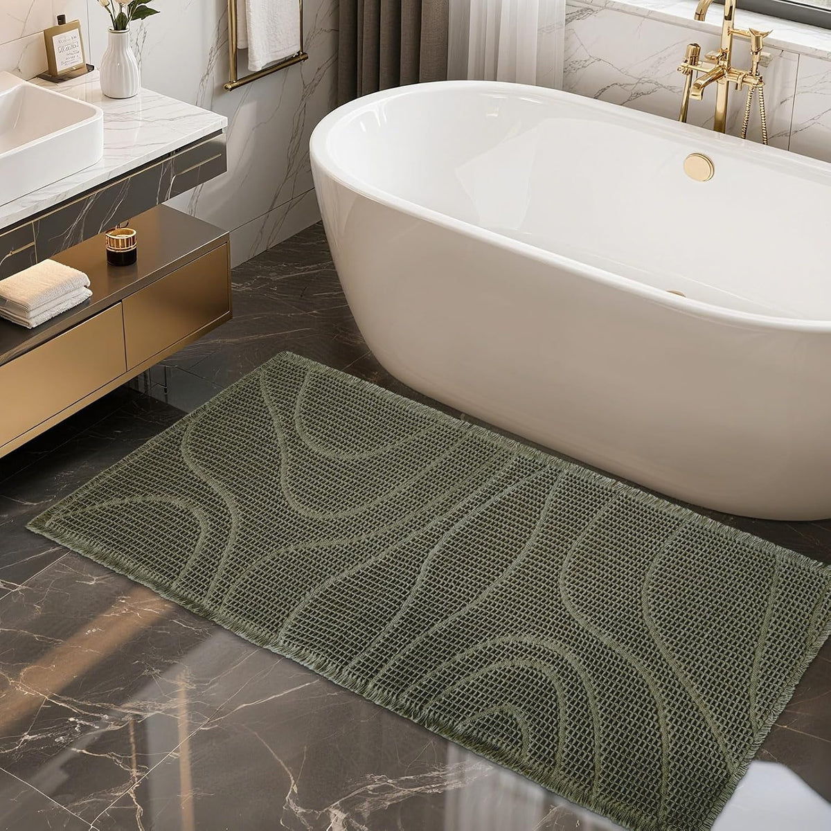 Olive-green rectangular mat with wavy textured pattern placed beside a freestanding bathtub