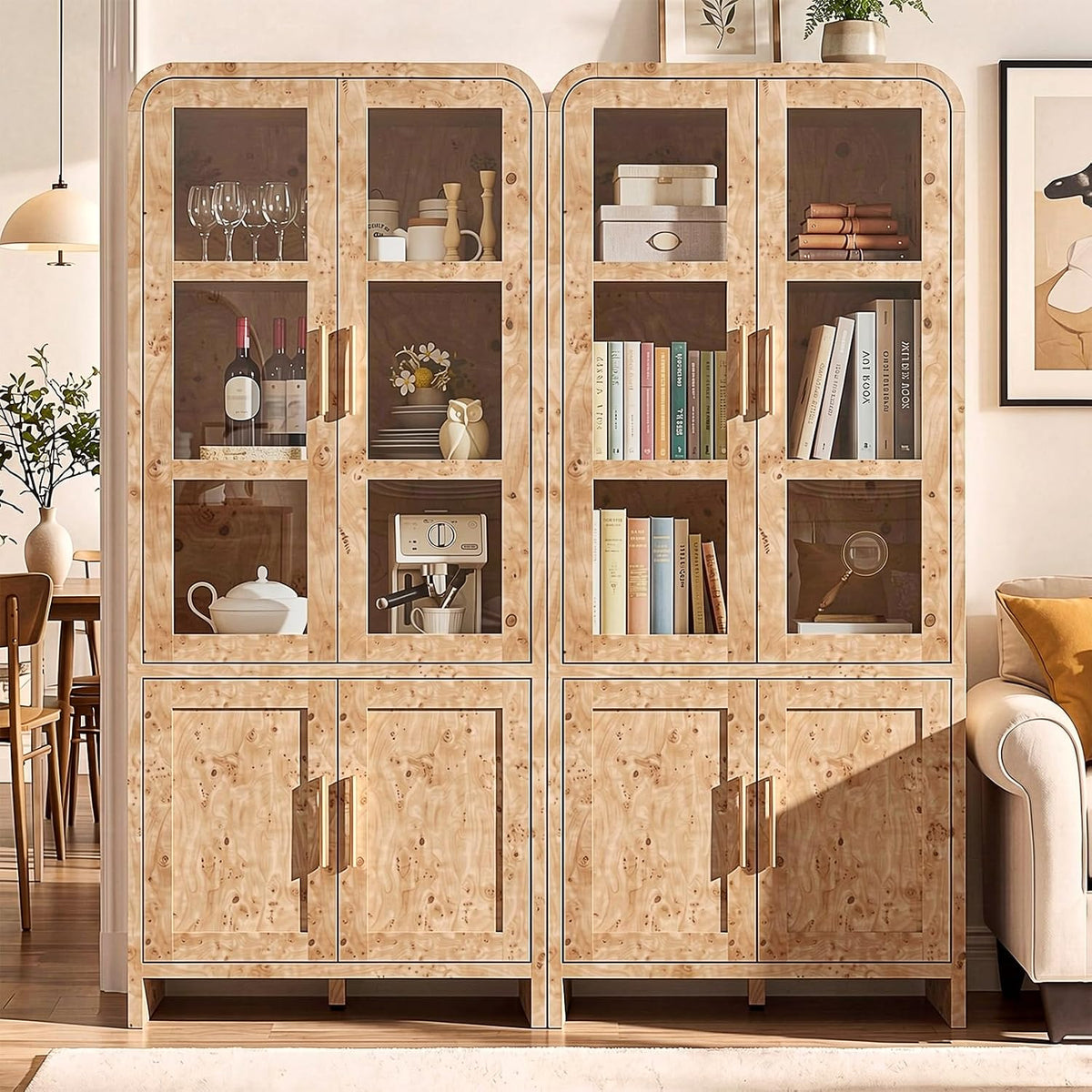Close front view of paired cabinets in a pale burl-style wood finish with pronounced grain.