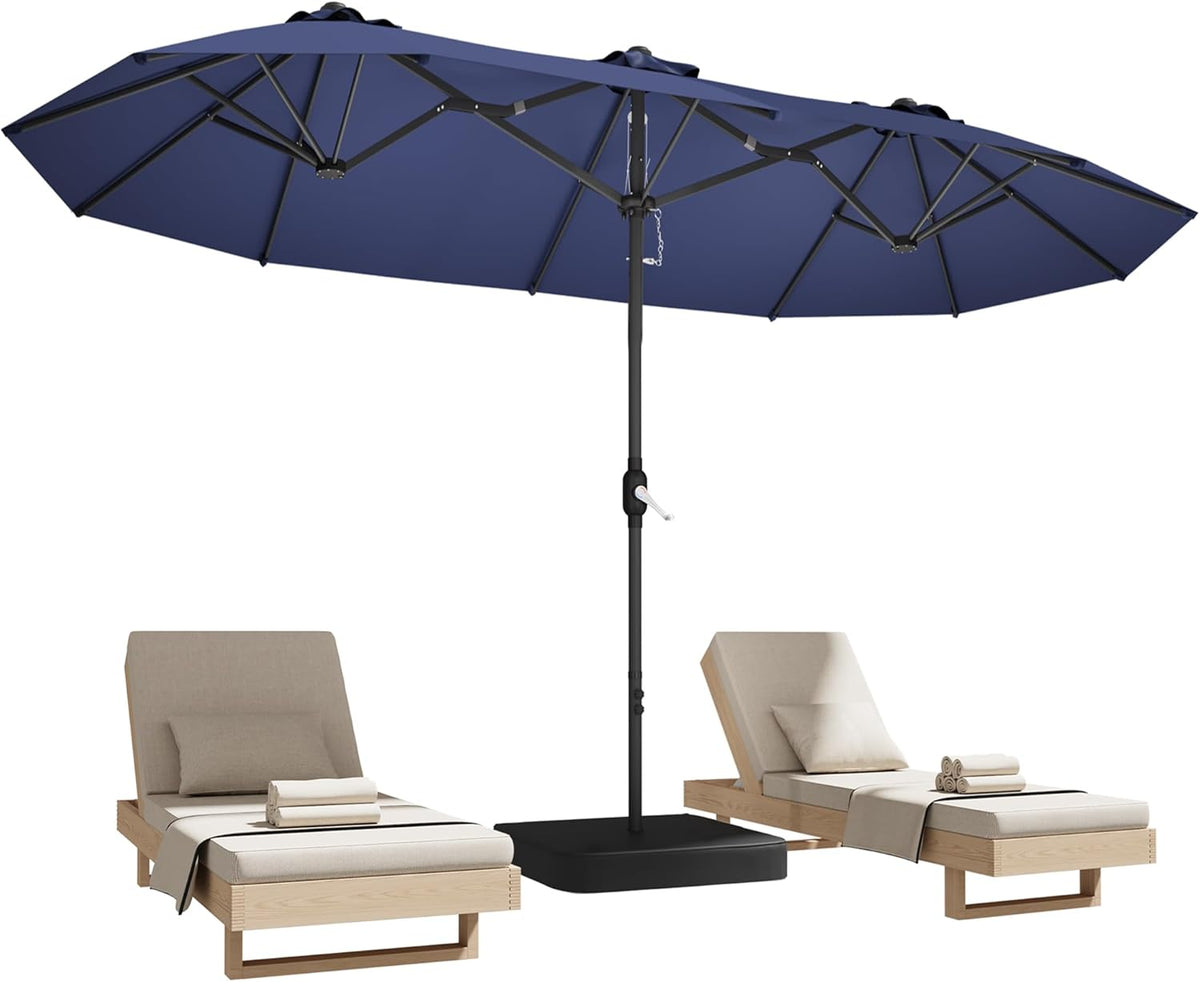 Studio view of a navy rectangular double-sided umbrella with crank and black base.