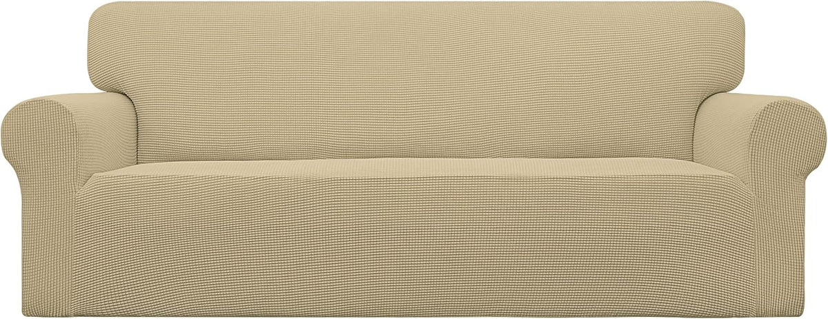 Front view of a two-cushion loveseat fully covered in a textured beige slipcover