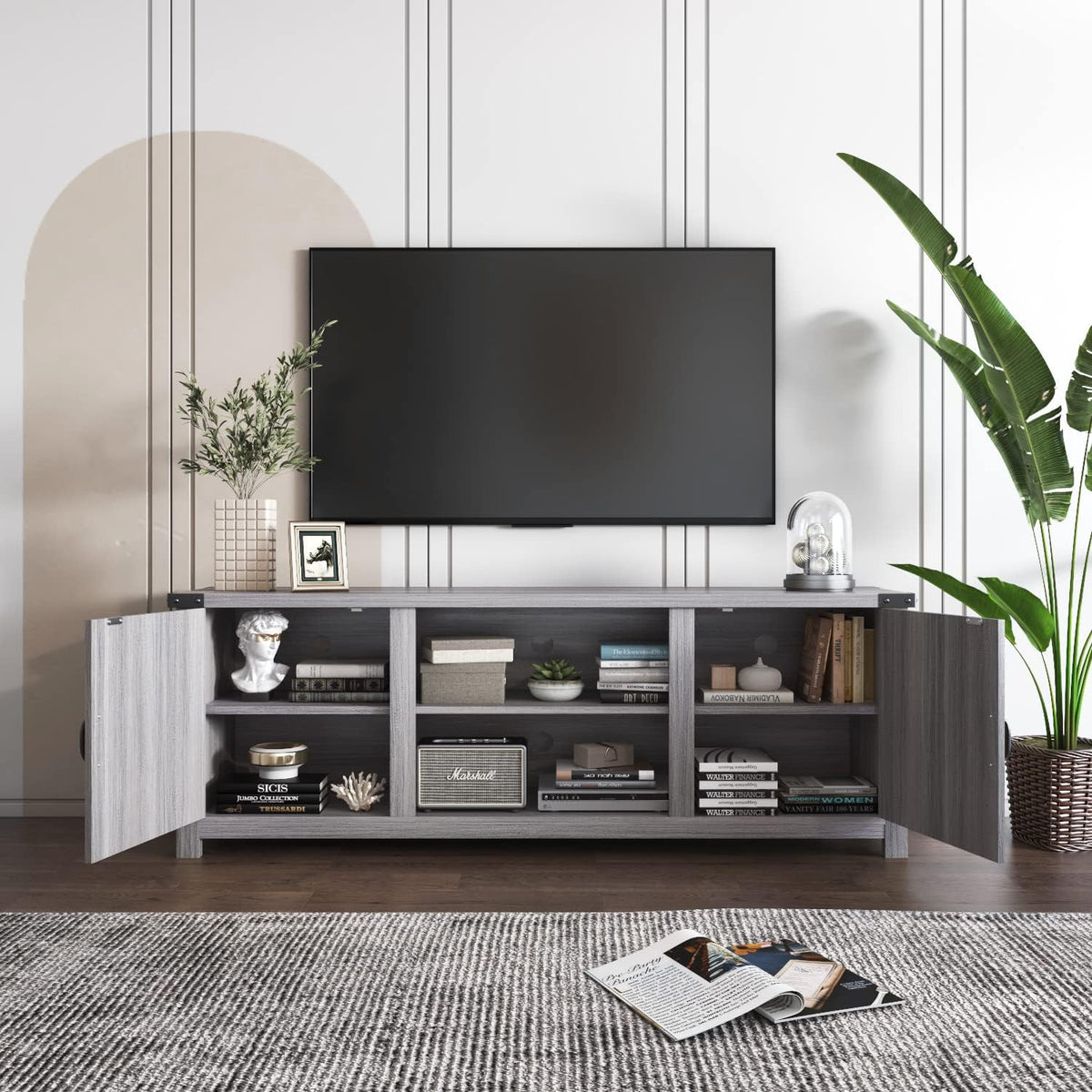Wide shot of gray wash 58-inch TV stand with both cabinet doors open showing the interior adjustable shelf.