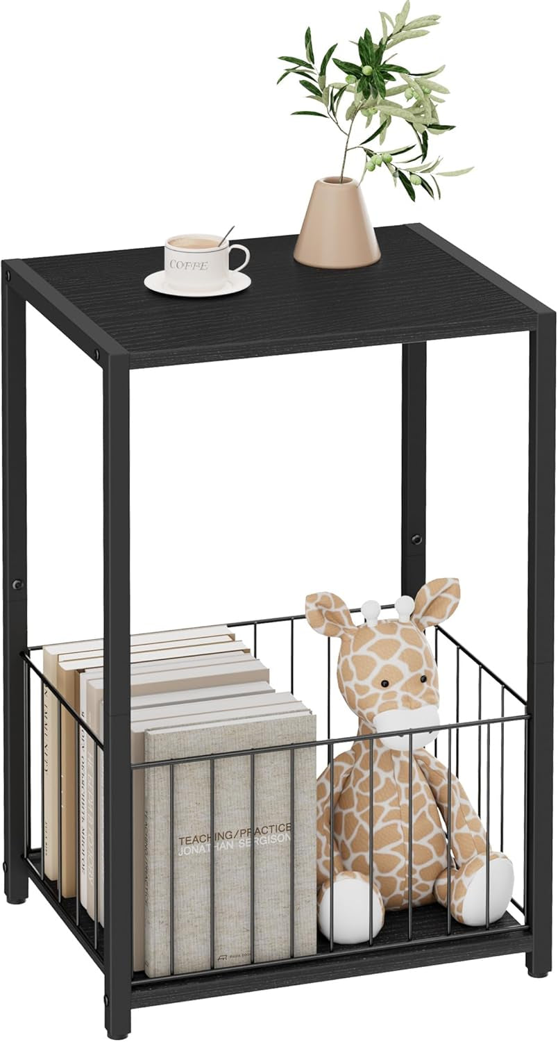 Black-top side table with black frame and wire basket filled with books and a plush giraffe toy