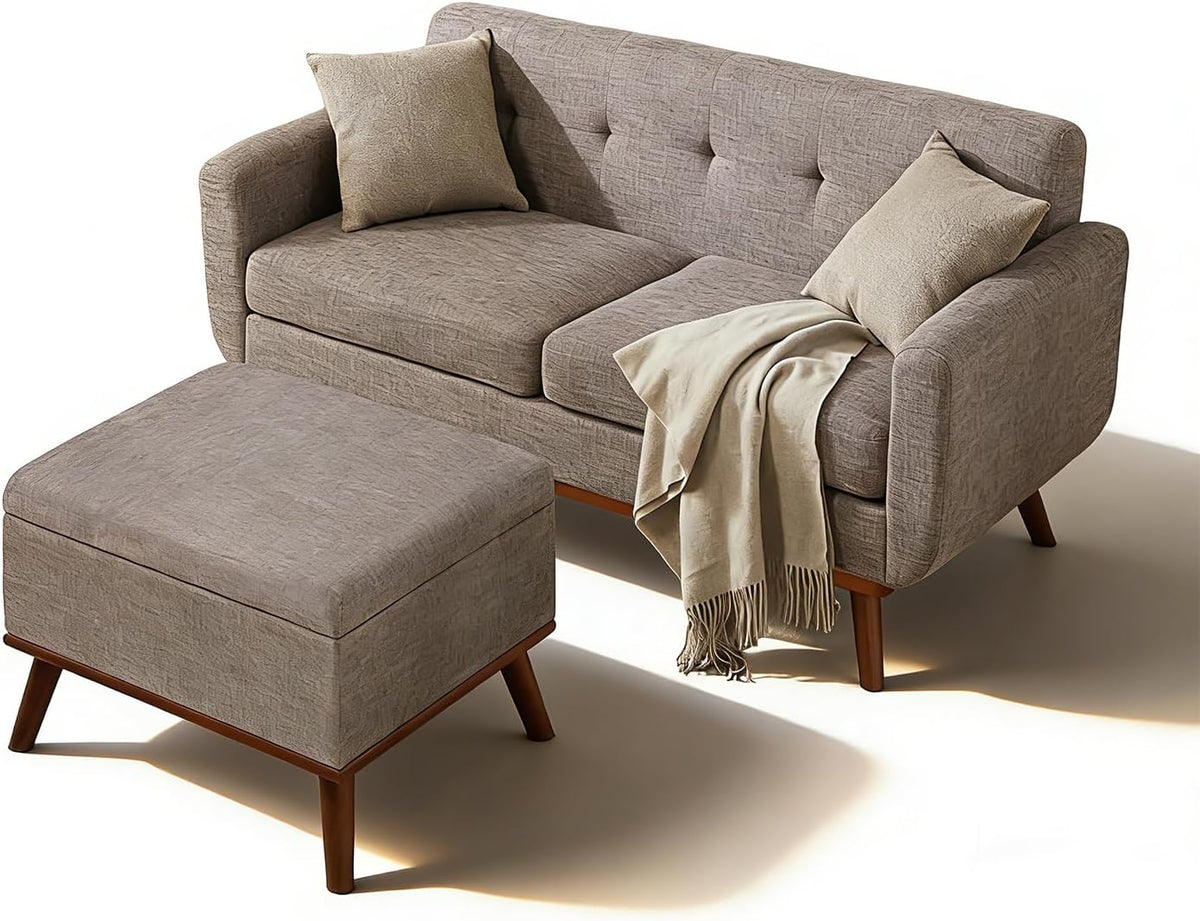 Beige/taupe tufted loveseat with matching ottoman on white background