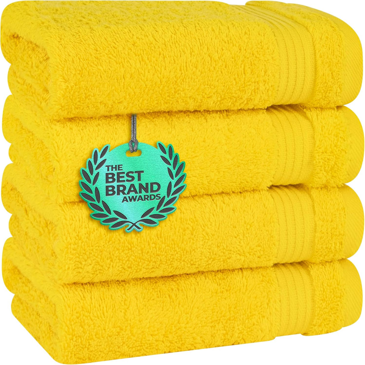Stack of bright yellow folded towels with a teal award tag hanging on the front