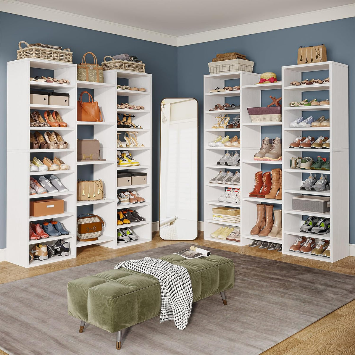 Multiple white shoe rack units arranged in a dressing area with a full-length mirror and ottoman, front view