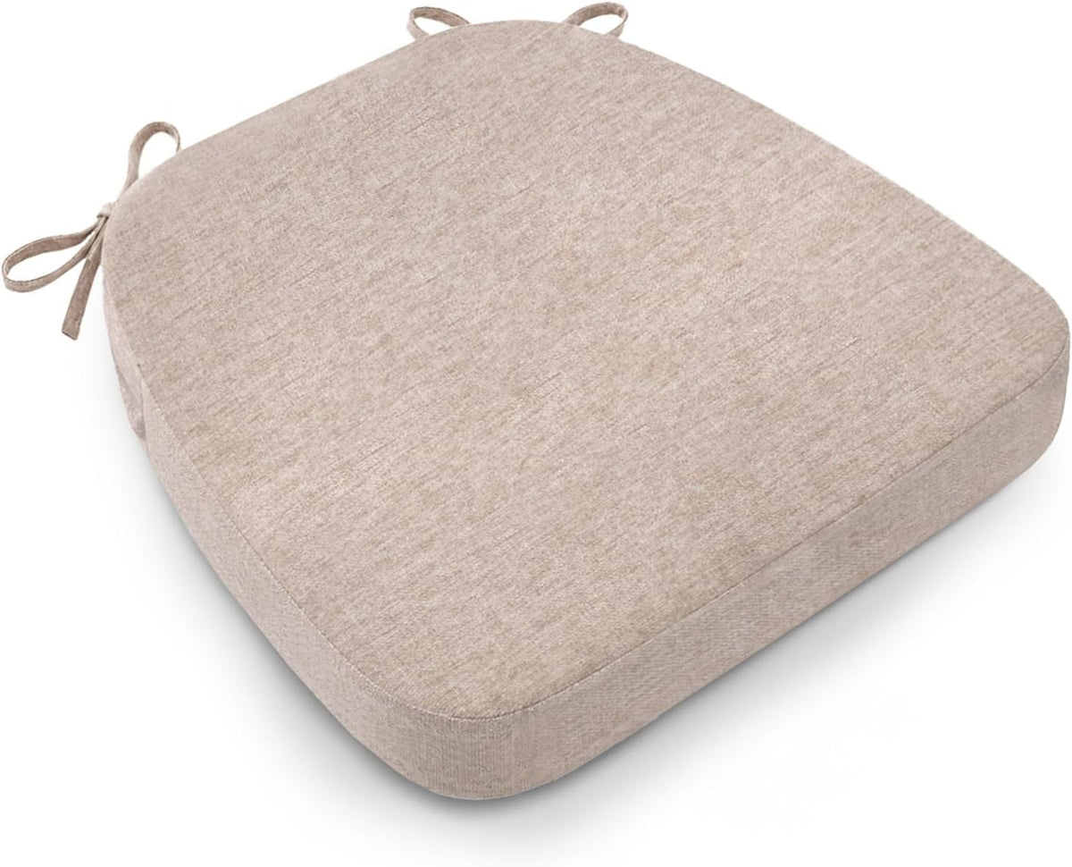 Single oatmeal beige D-shaped cushion photographed from a shallow angle showing top fabric and side seam.