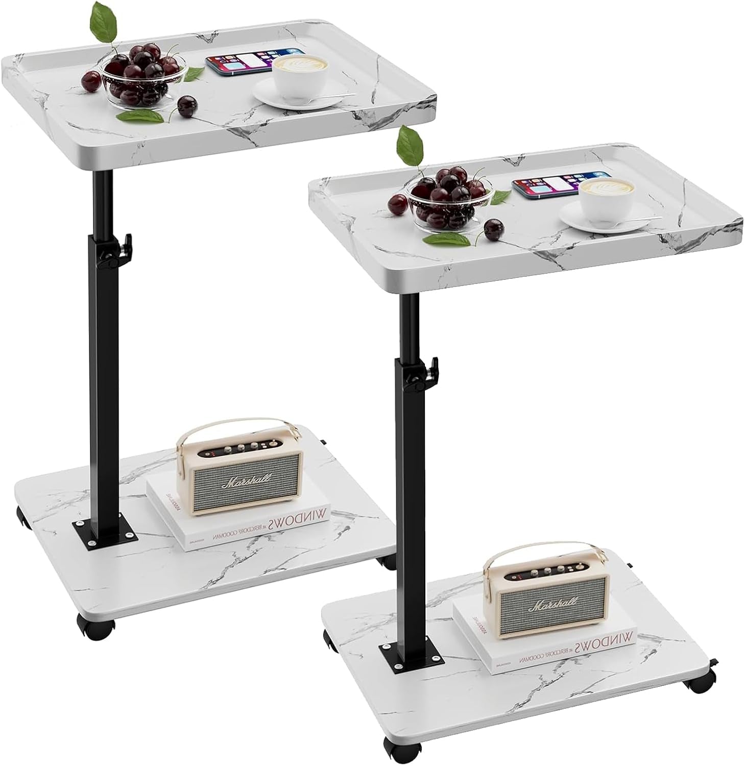 Pair of white marble-pattern C-shaped side tables with black stems and caster bases.