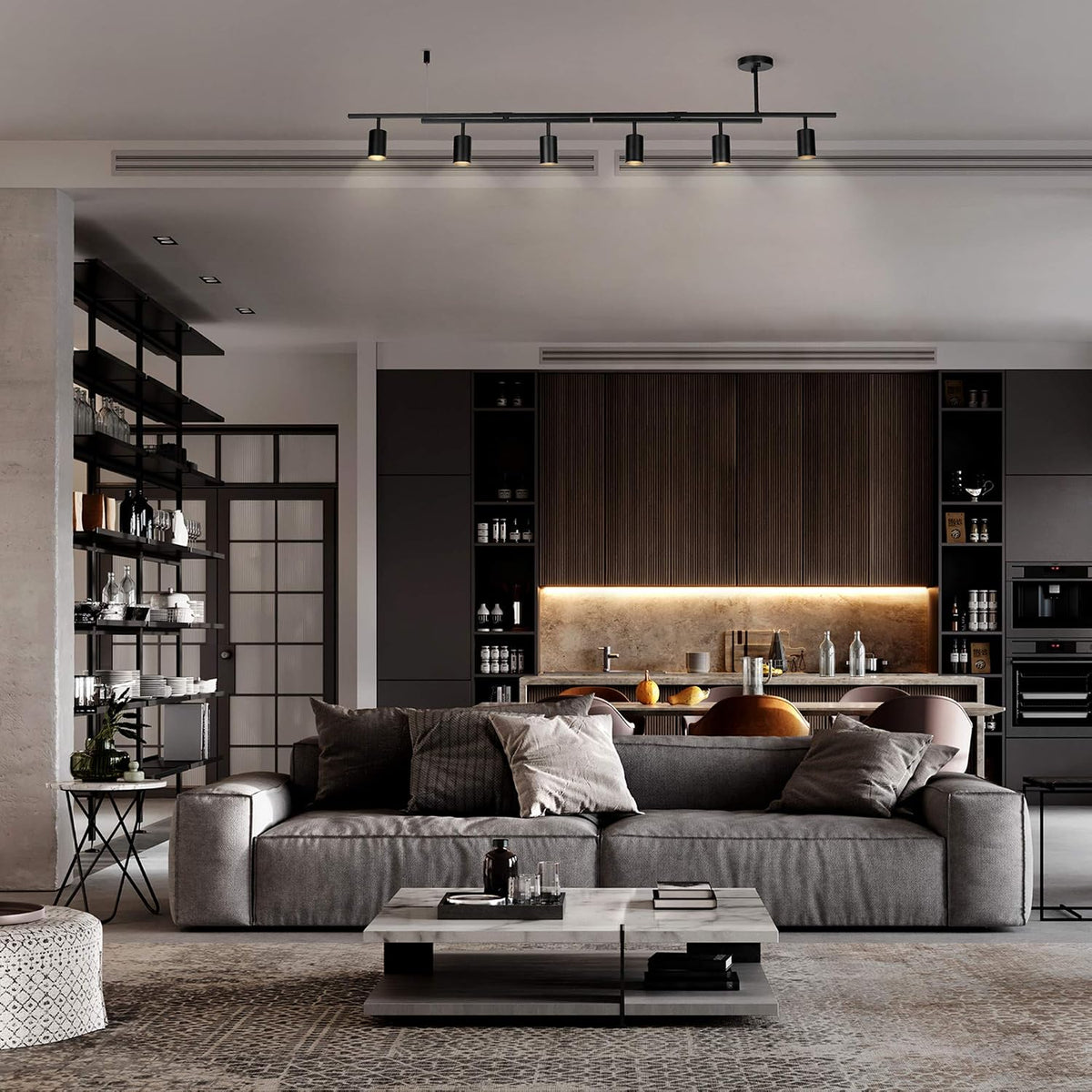 Matte black 6-light track lighting installed over a modern living room with sofa and open kitchen
