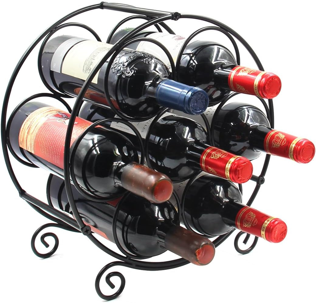 Black metal freestanding wine rack angled side view on a white background showing seven bottles.