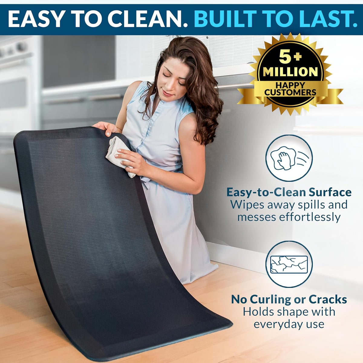 Woman wiping a flexible black anti-fatigue mat to show the easy-to-clean surface