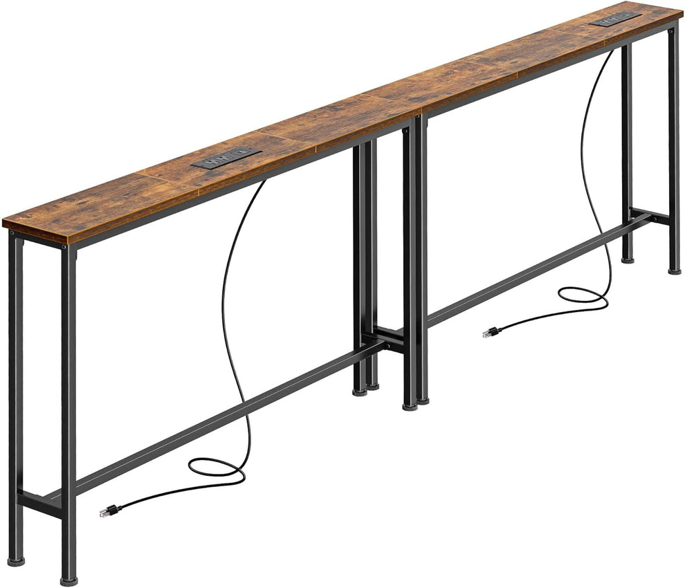 Long slim console table with a distressed brown wood top and black metal frame, two power cords visible