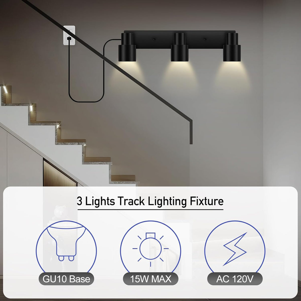 Black three-light plug-in track light installed on a ceiling above stairs with cord plugged into wall outlet