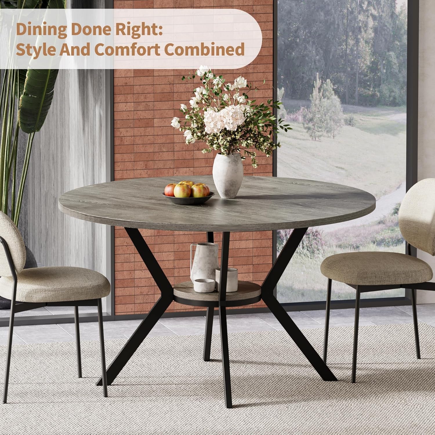 Side view of round gray wood table showing angled black metal legs and small center shelf with decorative vases.
