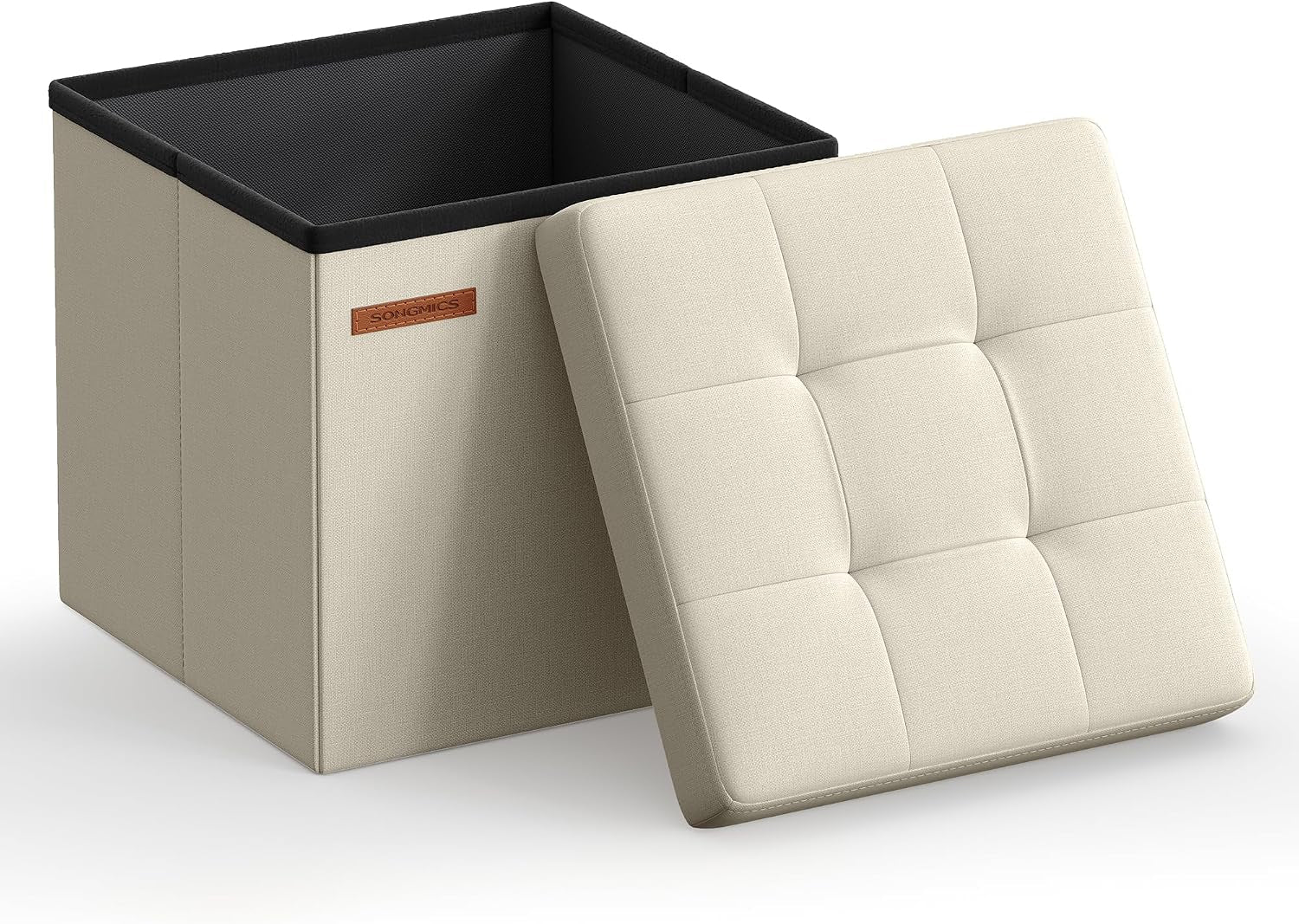 Open light beige storage cube with matching tufted lid resting nearby