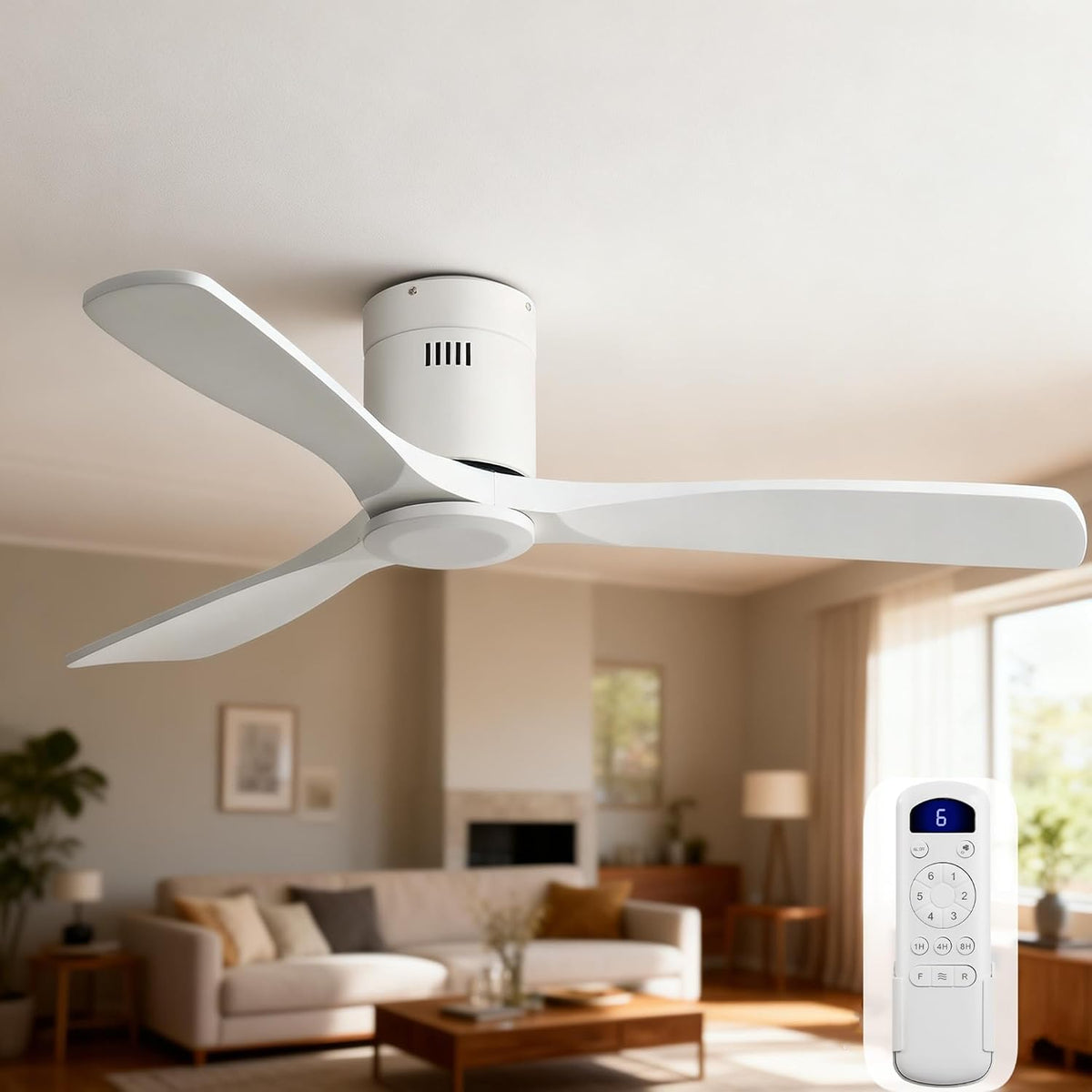 White three-blade flush-mount ceiling fan installed on a living room ceiling, with a white handheld remote pictured at right.