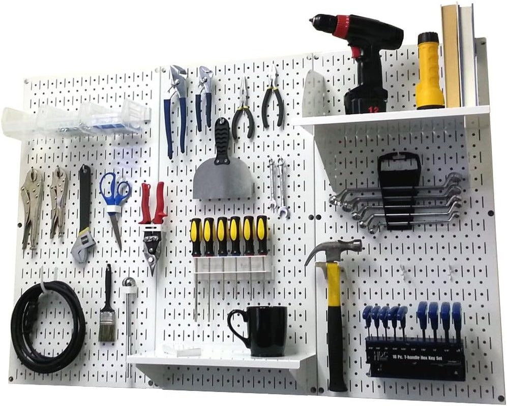 White pegboard displaying tools, a mug on a small shelf and a hammer hanging on the board
