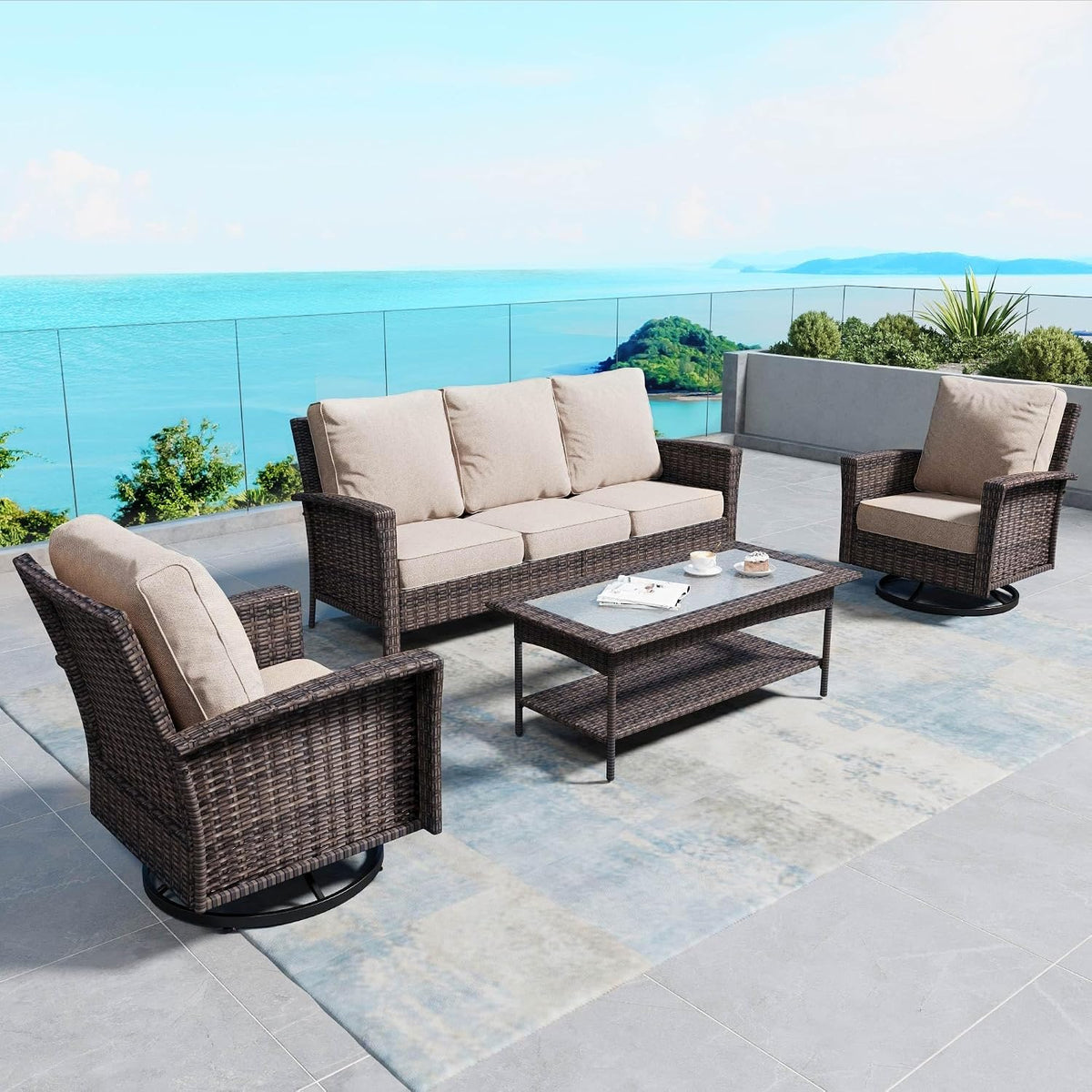 Patio conversation set with three-seat wicker sofa and swivel chairs in beige cushions on a tiled terrace.