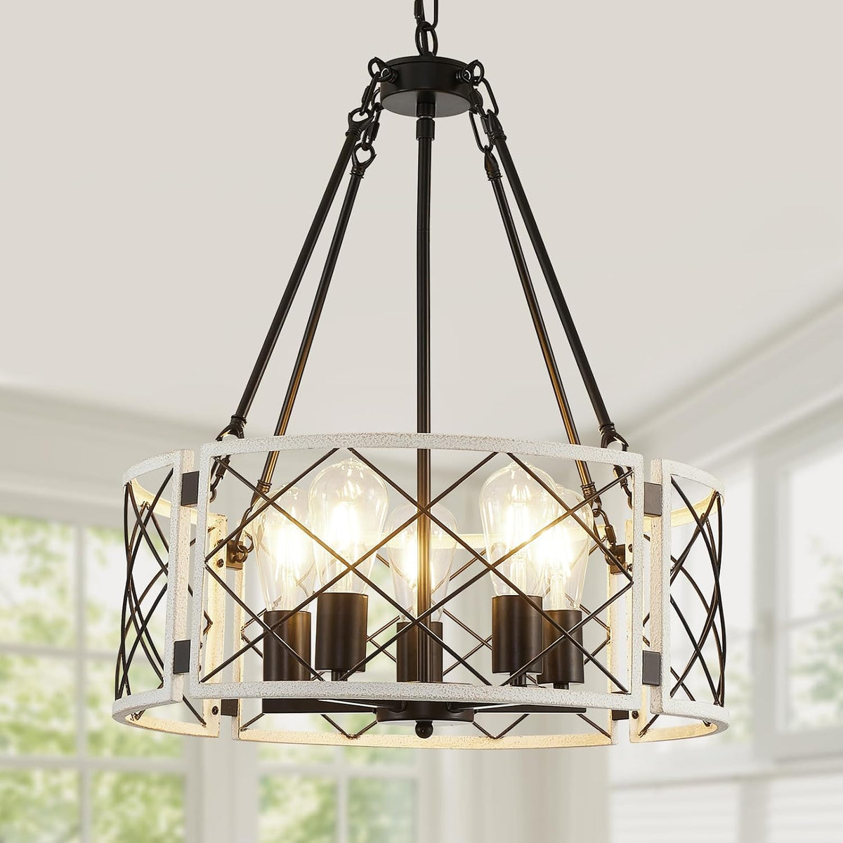 Close view of a round white distressed metal drum with crisscross black lattice and exposed bulbs inside.