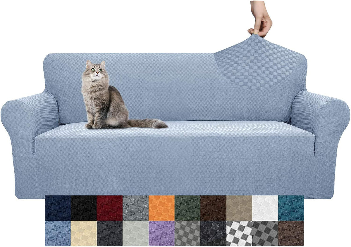 Light blue jacquard stretch sofa cover on three-seat sofa with a grey cat and color swatches below