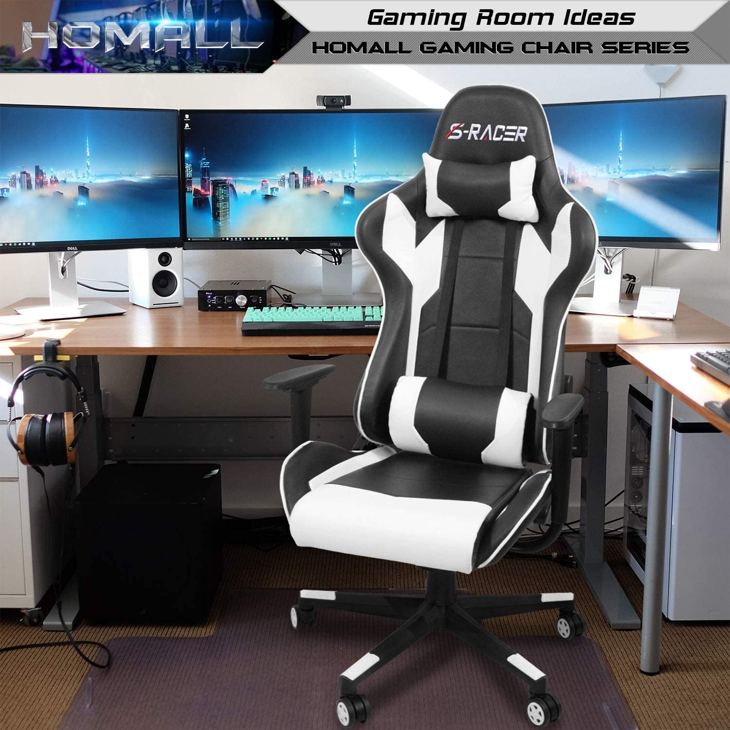 Black and white high-back office chair placed in a desk setup with triple monitors in the background