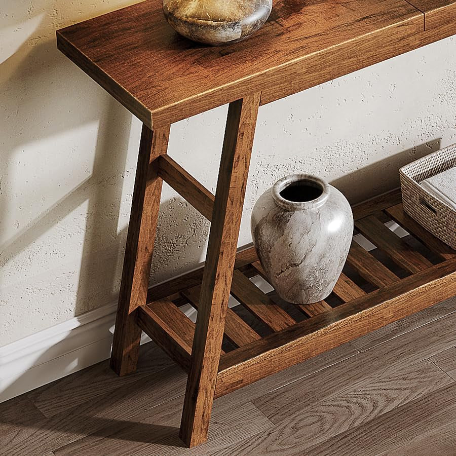 Close-up of the table's left leg and slatted lower shelf holding a ceramic vase and woven basket corner.