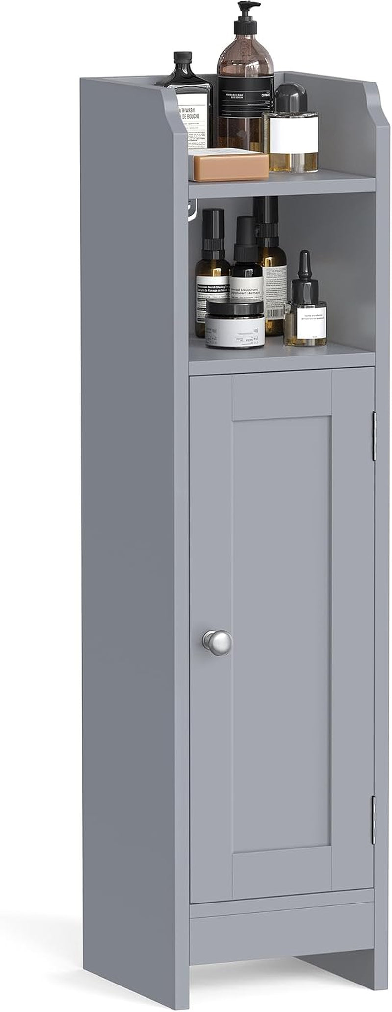 Tall narrow gray storage cabinet with two open shelves above a lower door, shown holding bottles and jars.