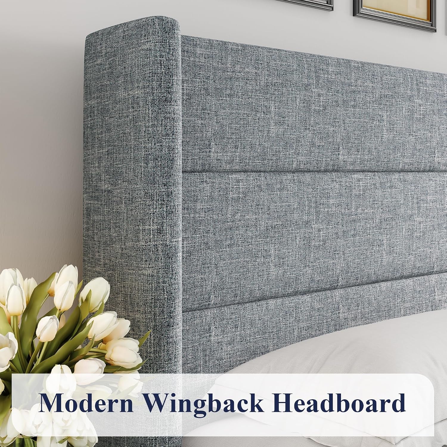 Close-up of the gray upholstered wingback headboard showing horizontal channeling and textured fabric next to a vase of
