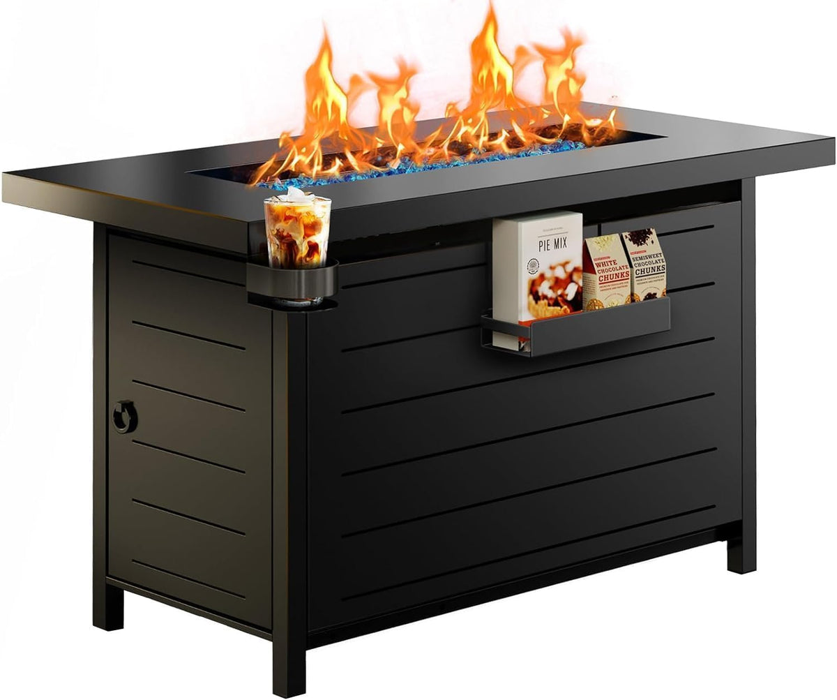 Studio view of a rectangular-top fire pit table with long burner flame, cup holder and small shelf on the side.